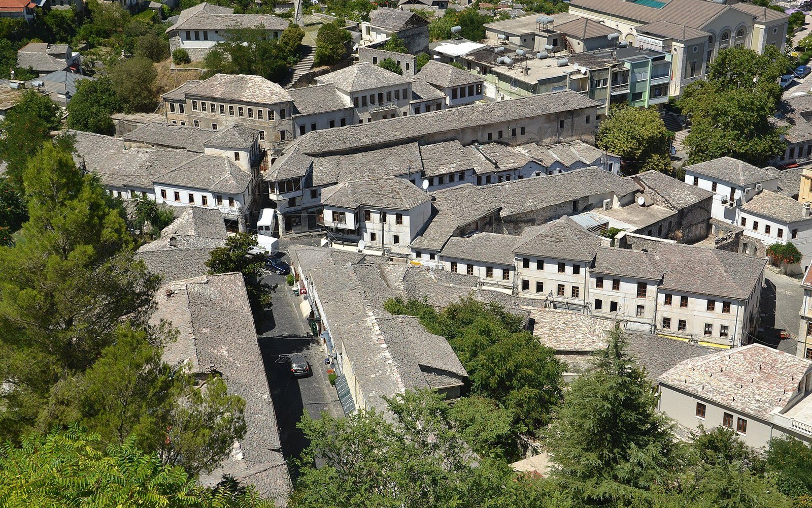 Stone-roofed houses packed along a slope, seen from above